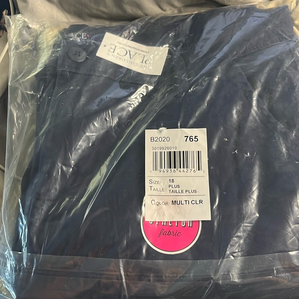 New with tags ! Children’s place size 18 (2) pack blue and tan pants